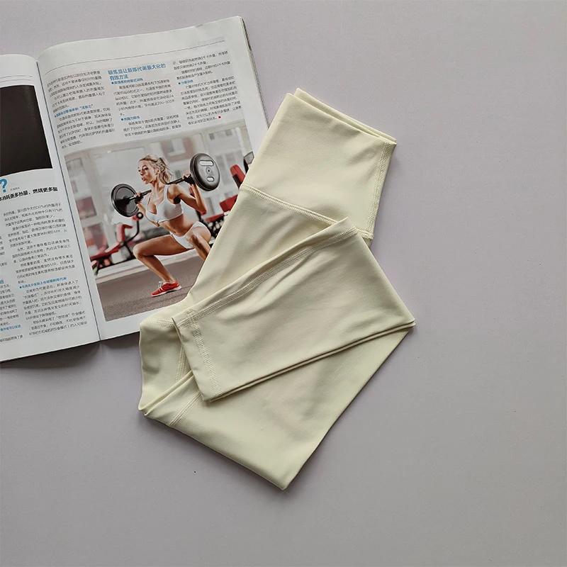 Pantalons de yoga nus taille haute pour femmes portant un ajustement serré levage des hanches Leggin
