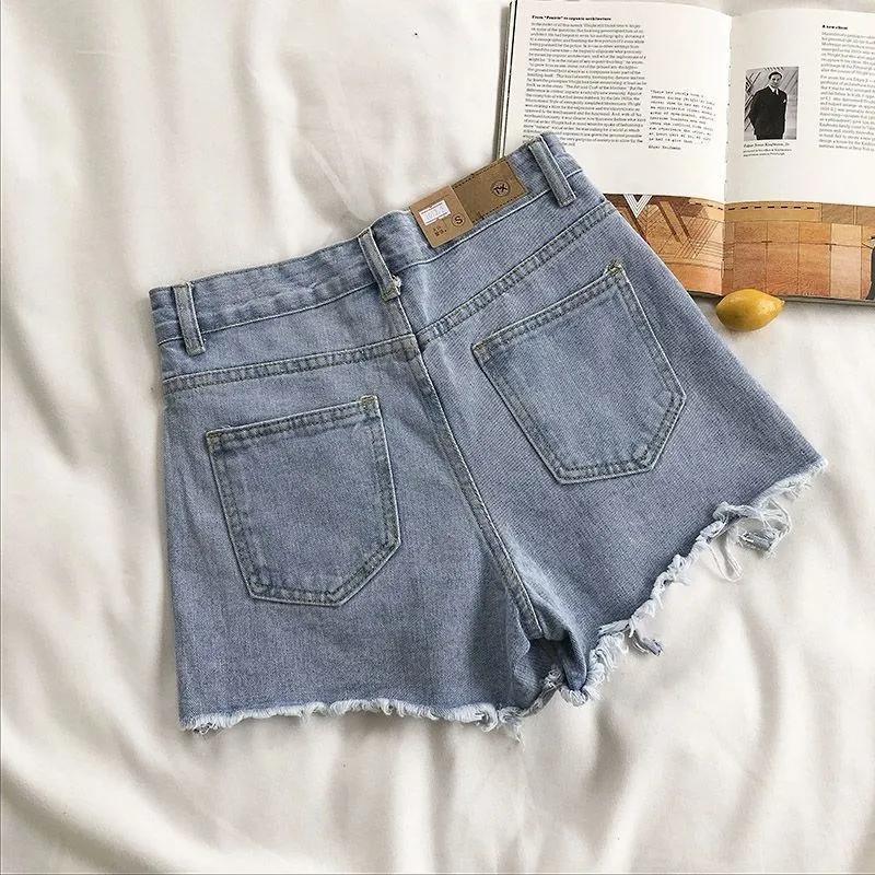 Short en jean déchiré taille haute pour femme, mode coréenne d'été, jean décontracté, poche, pompon,