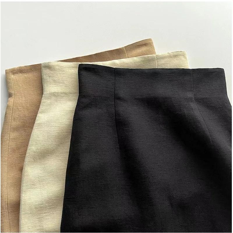 Jupe simple taille haute en lin et laine, atmosphère artistique espagnole, ourlet texturé, fente lat