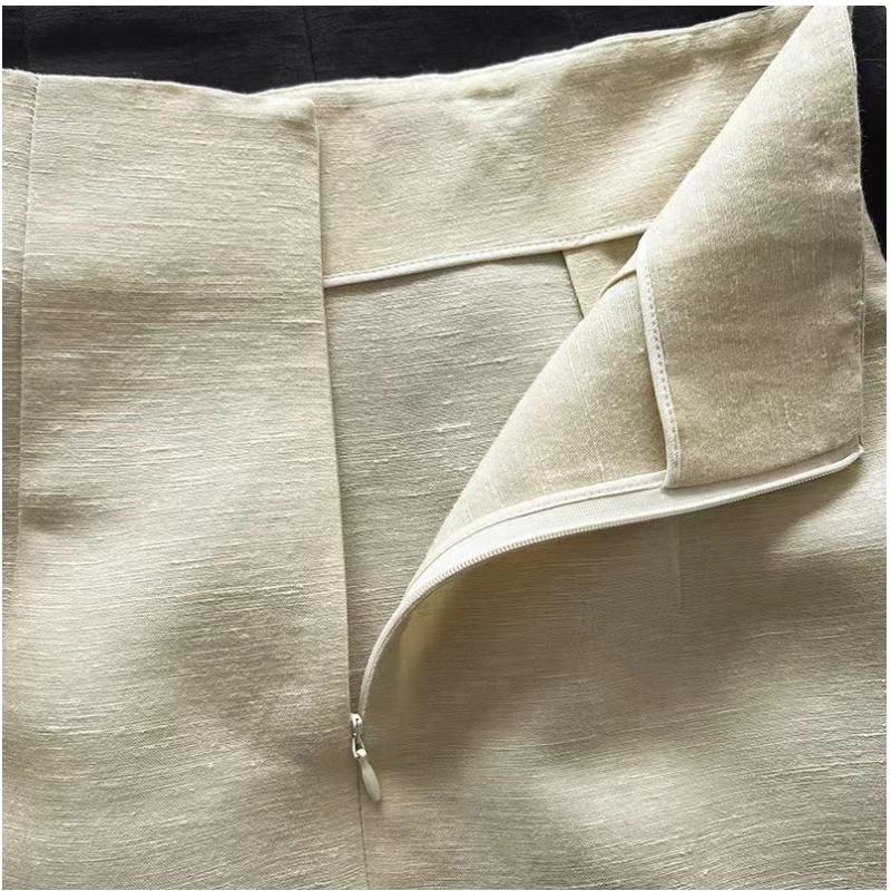 Jupe simple taille haute en lin et laine, atmosphère artistique espagnole, ourlet texturé, fente lat