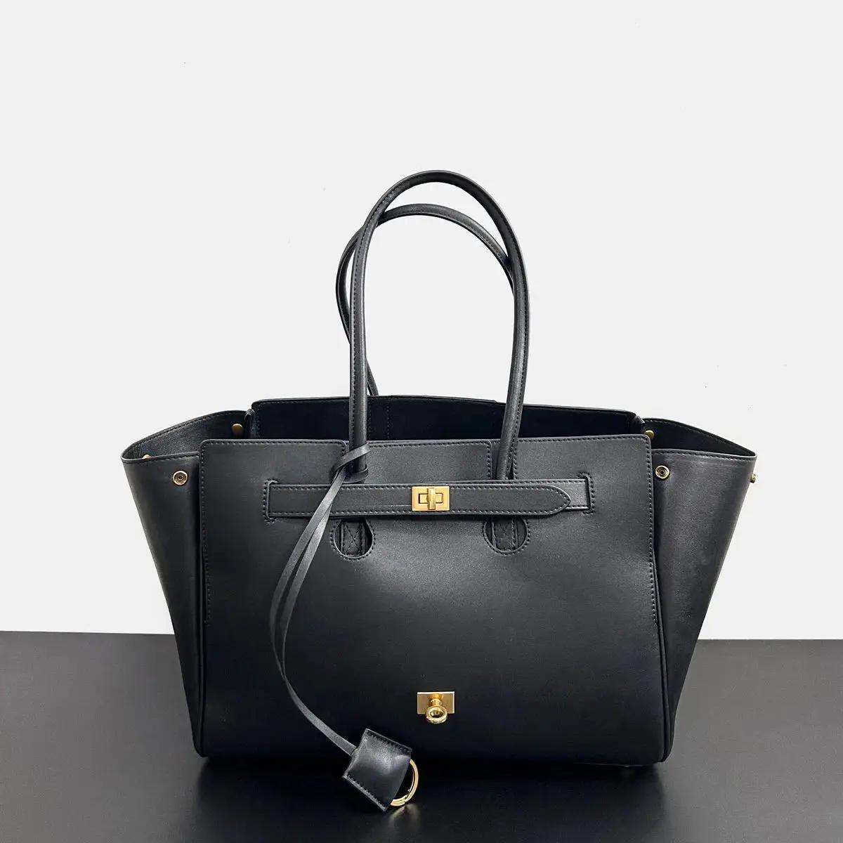 Sac à bandoulière de luxe grande capacité en cuir noir de haute qualité avec fermoir argenté/doré, s