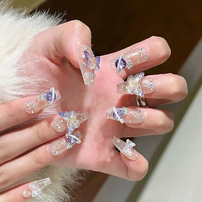 10 pièces presse à la main sur les ongles grand planète conçu faux ongles avec papillon Art paillett