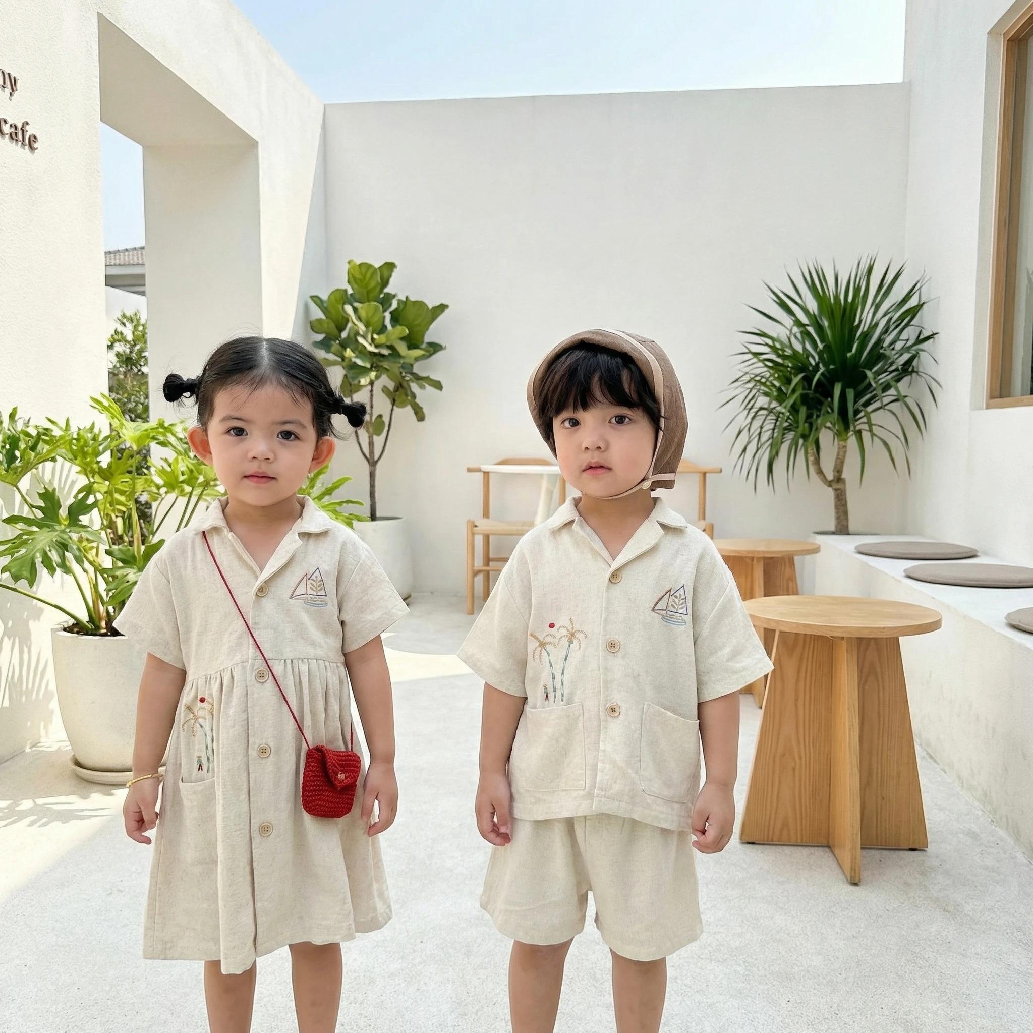 Nouvel ensemble d'été pour enfants style vacances : Robe trapèze en lin brodée bateau à voile pour f