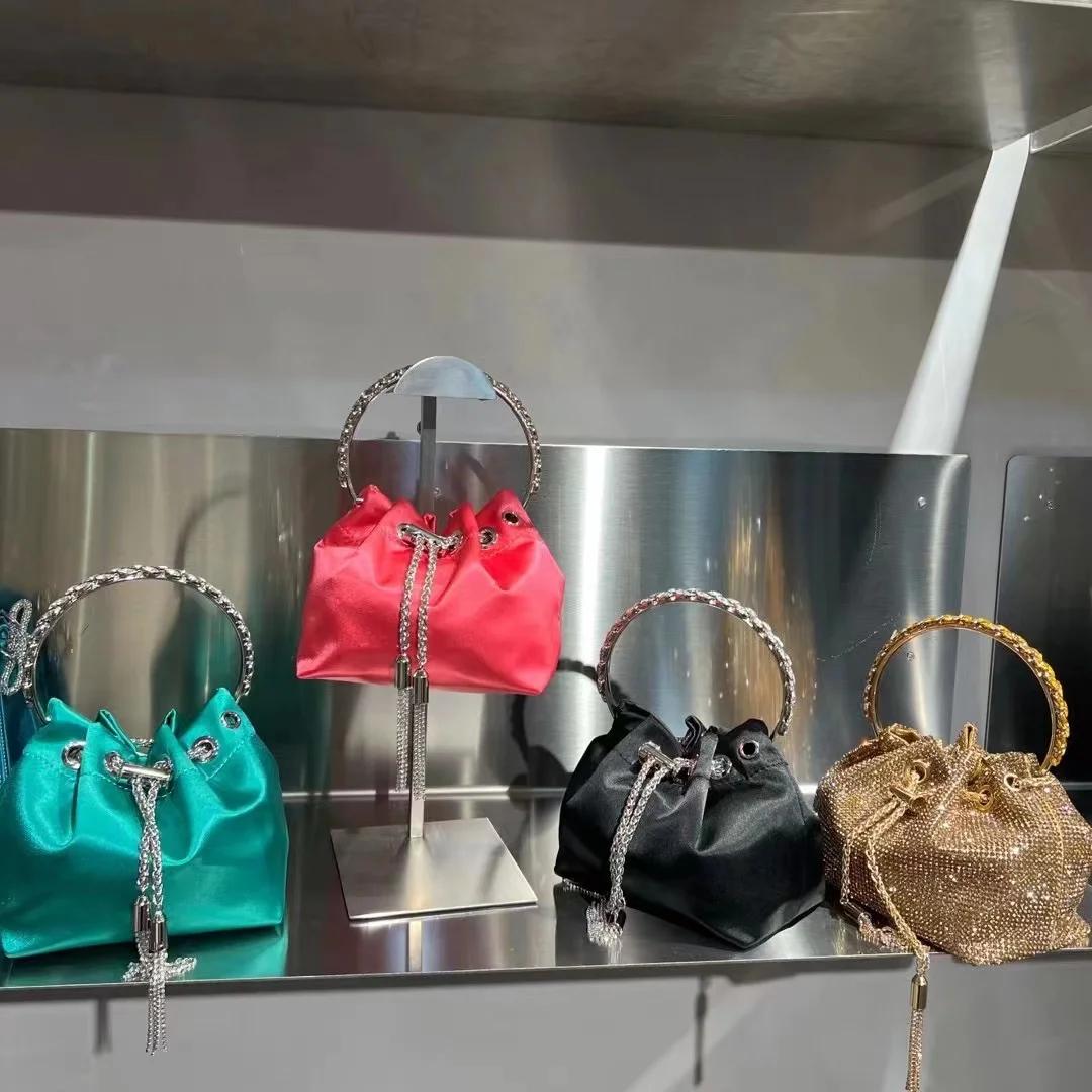 Sac à main de luxe avec diamants scintillants et pompon pour femme, bague en métal, pochette de fête