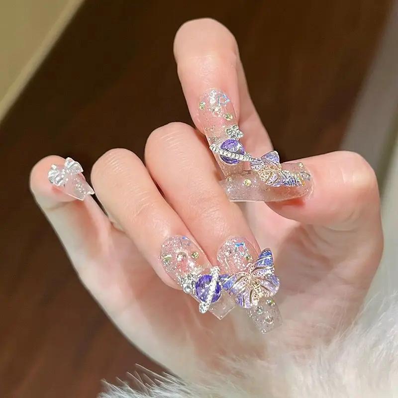 10 pièces presse à la main sur les ongles grand planète conçu faux ongles avec papillon Art paillett
