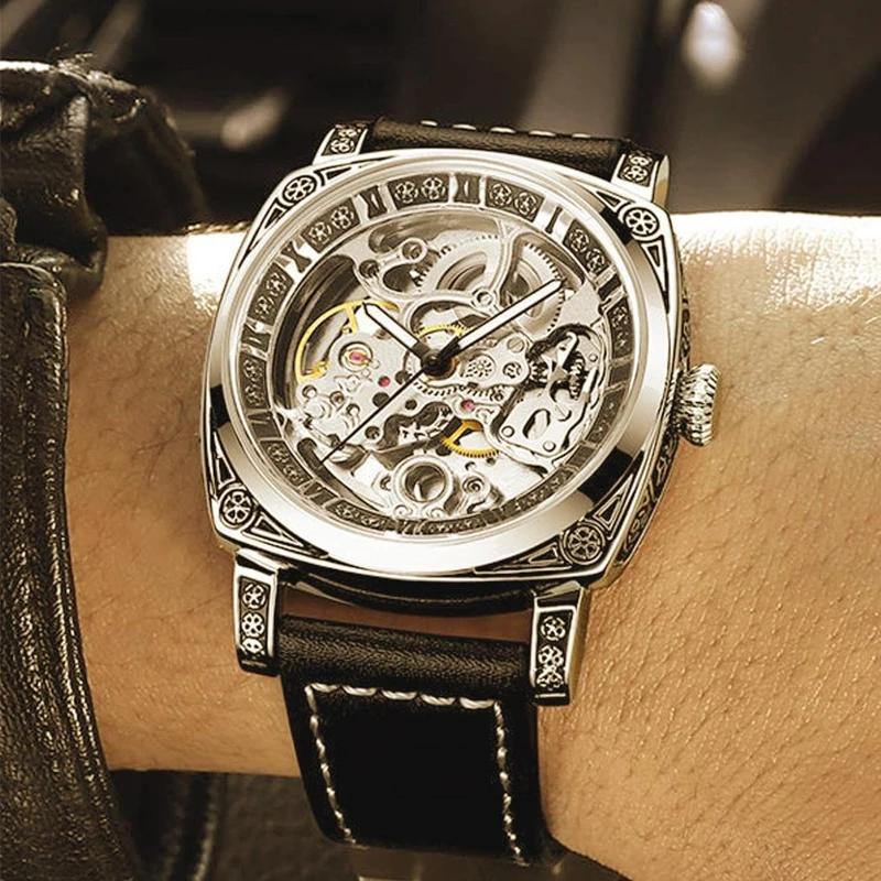 Une montre mécanique creuse à Tourbillon entièrement automatique sculptée lumineuse de Style d'affai