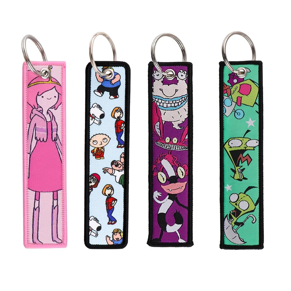 Personnages mignons Jet Tag nouvelle étiquette de clé de broderie porte-clés pour motos voitures sac