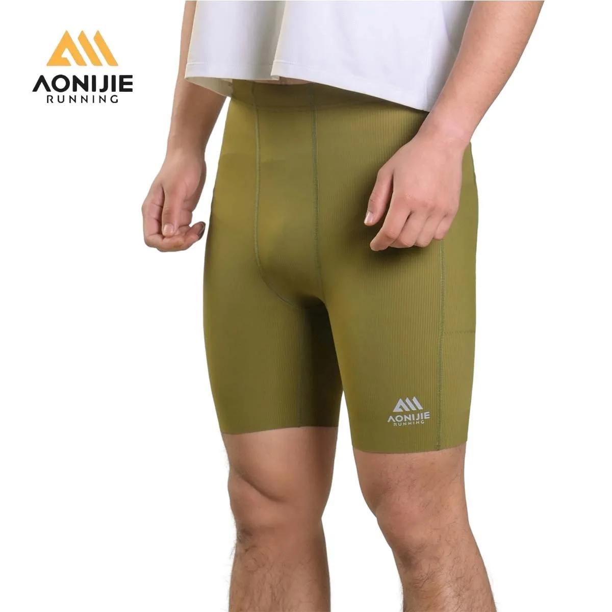 AONIJIE FM5255 Short de compression haute élasticité à séchage rapide et respirant avec poches pour 