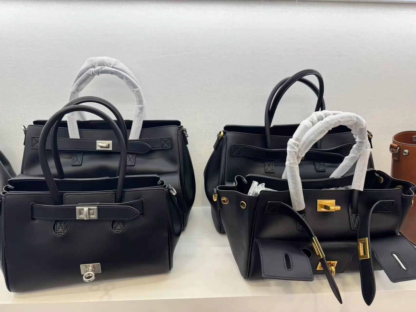 Sac à bandoulière de luxe grande capacité en cuir noir de haute qualité avec fermoir argenté/doré, s