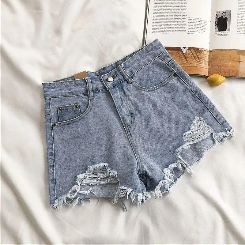 Short en jean déchiré taille haute pour femme, mode coréenne d'été, jean décontracté, poche, pompon,