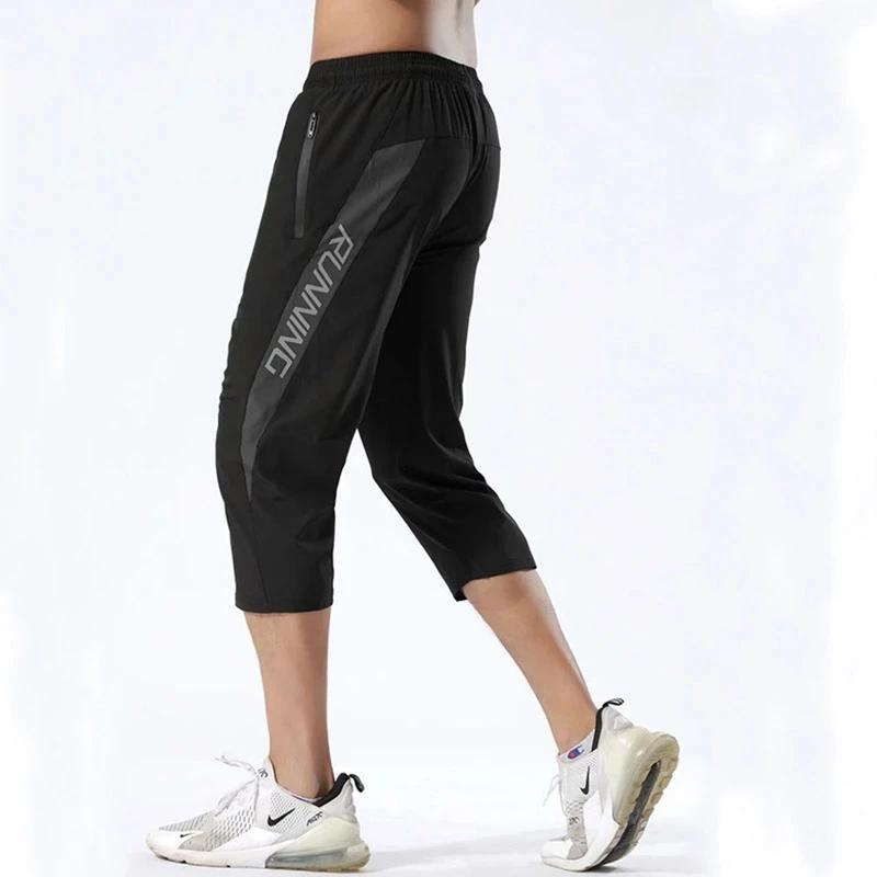 Pantalon sport homme poches zippées - Jogging entraînement 3/4 - Musculation football fitness running