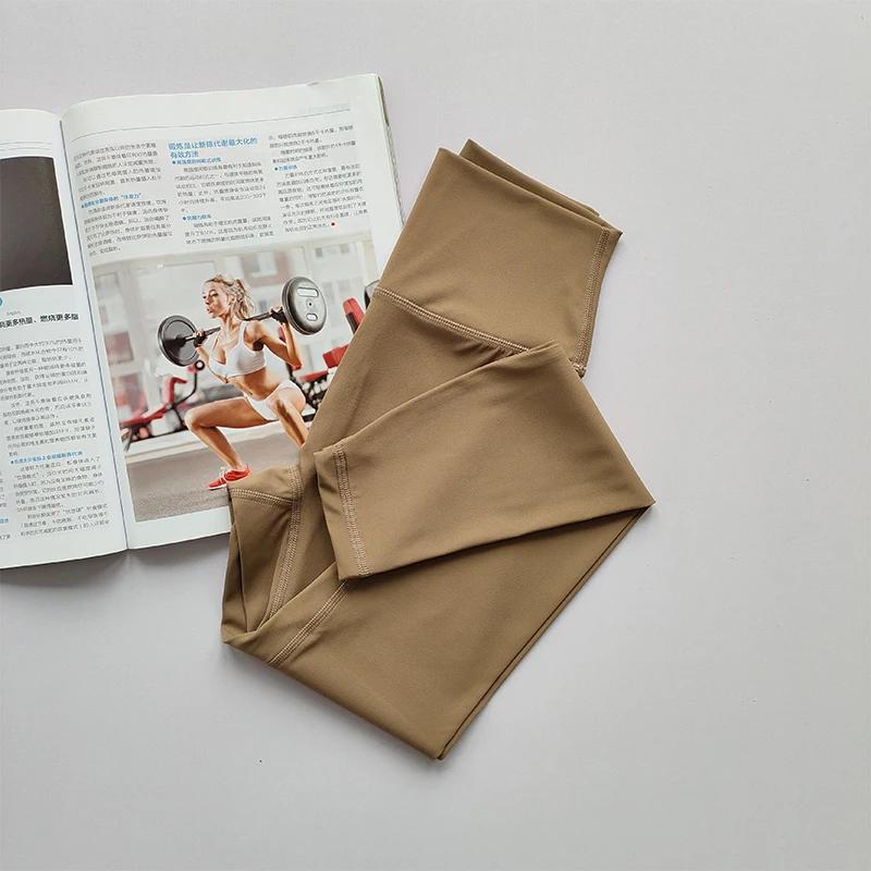 Pantalons de yoga nus taille haute pour femmes portant un ajustement serré levage des hanches Leggin