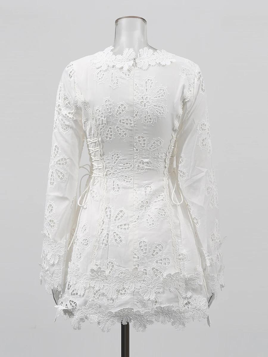 TWOTWINSTYLE solide évider Mini robes pour femmes col en V longue sans manches taille haute tempéram