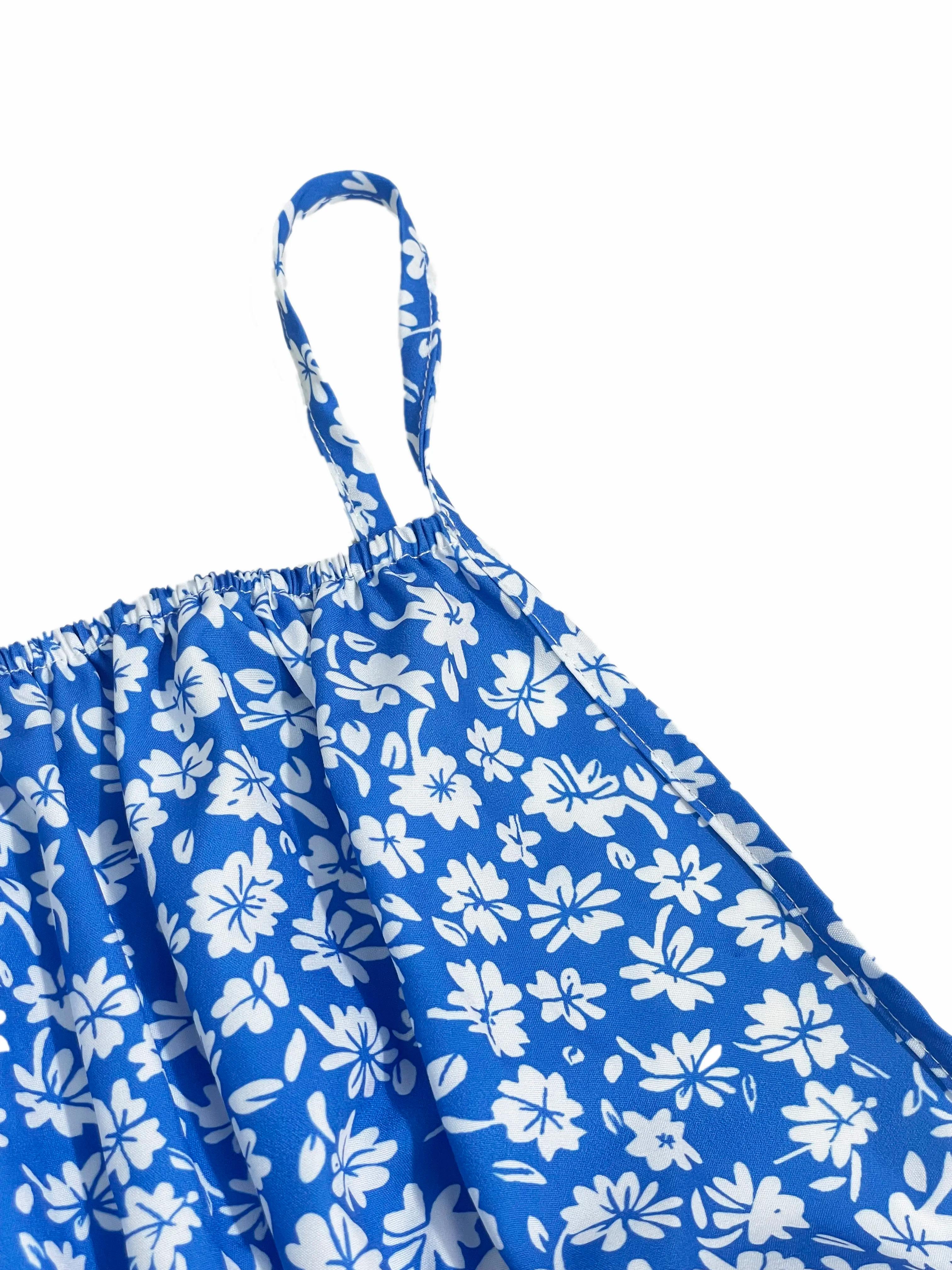 La robe caraco à petites fleurs imprime un design dos nu et des fines bretelles spaghetti convient a