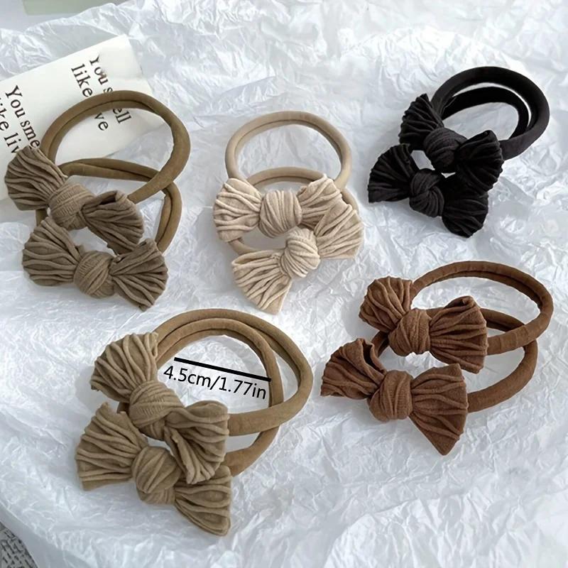 Porte-queue de cheval en tissu à haute élasticité avec nœud papillon de couleur unie – Accessoires p