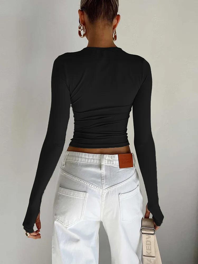 Mode femmes T-shirt à manches longues col rond solide coupe ajustée dames haut court avec trous pour