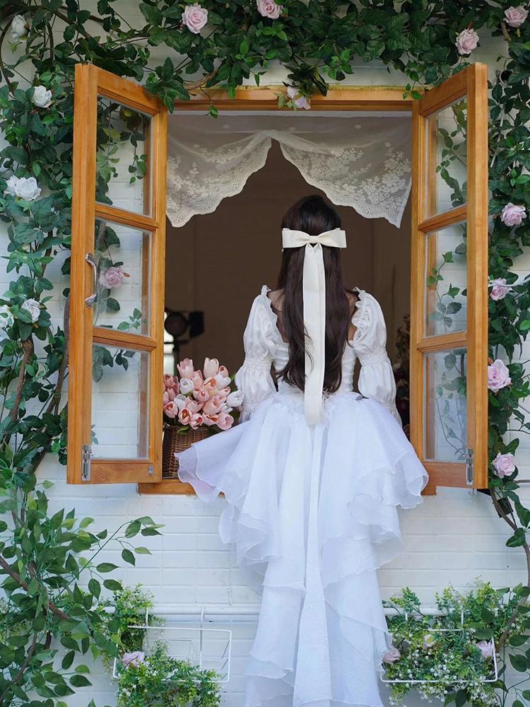 REDDACHiC Robe de soirée princesse pour femmes, broderie florale blanche, manches bouffantes, dos nu