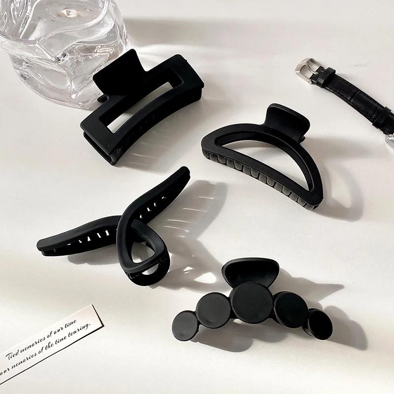 Pince à cheveux élégante noire géométrique en plastique pour femme, support de cheveux longs, pinces
