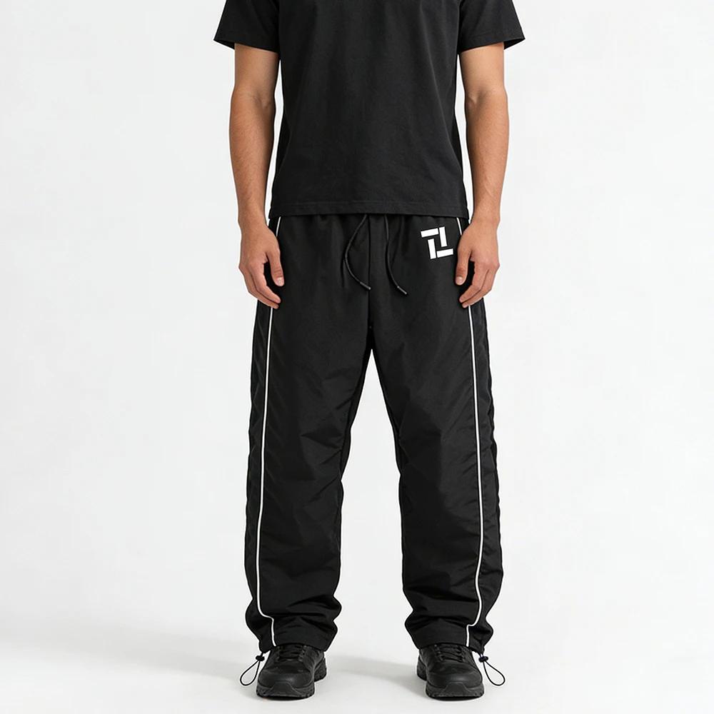 Pantalon de survêtement d'entraînement de fitness pour homme noir avec rayures latérales blanches imprimé géométrique pour sport et loisirs