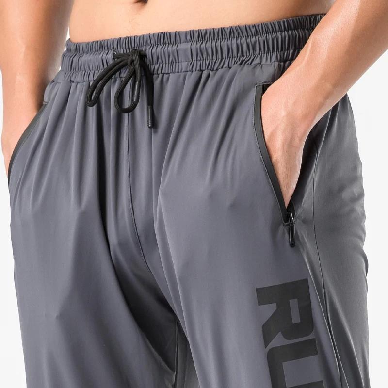 Pantalon survêtement gym homme fitness mince ajusté séchage rapide course entraînement