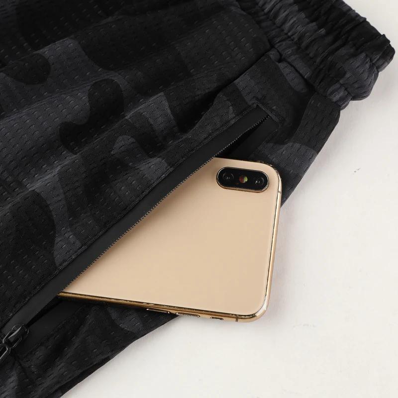 CamSolomon-Short de sport en maille à séchage rapide pour homme, pantalon respirant avec poche zippé
