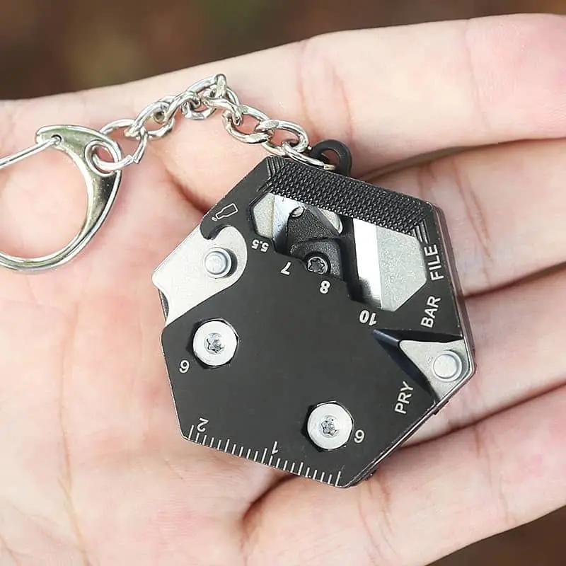 Pièce hexagonale multifonctionnelle pour l'extérieur, outil EDC, couteau à monnaie pliant, porte-clé