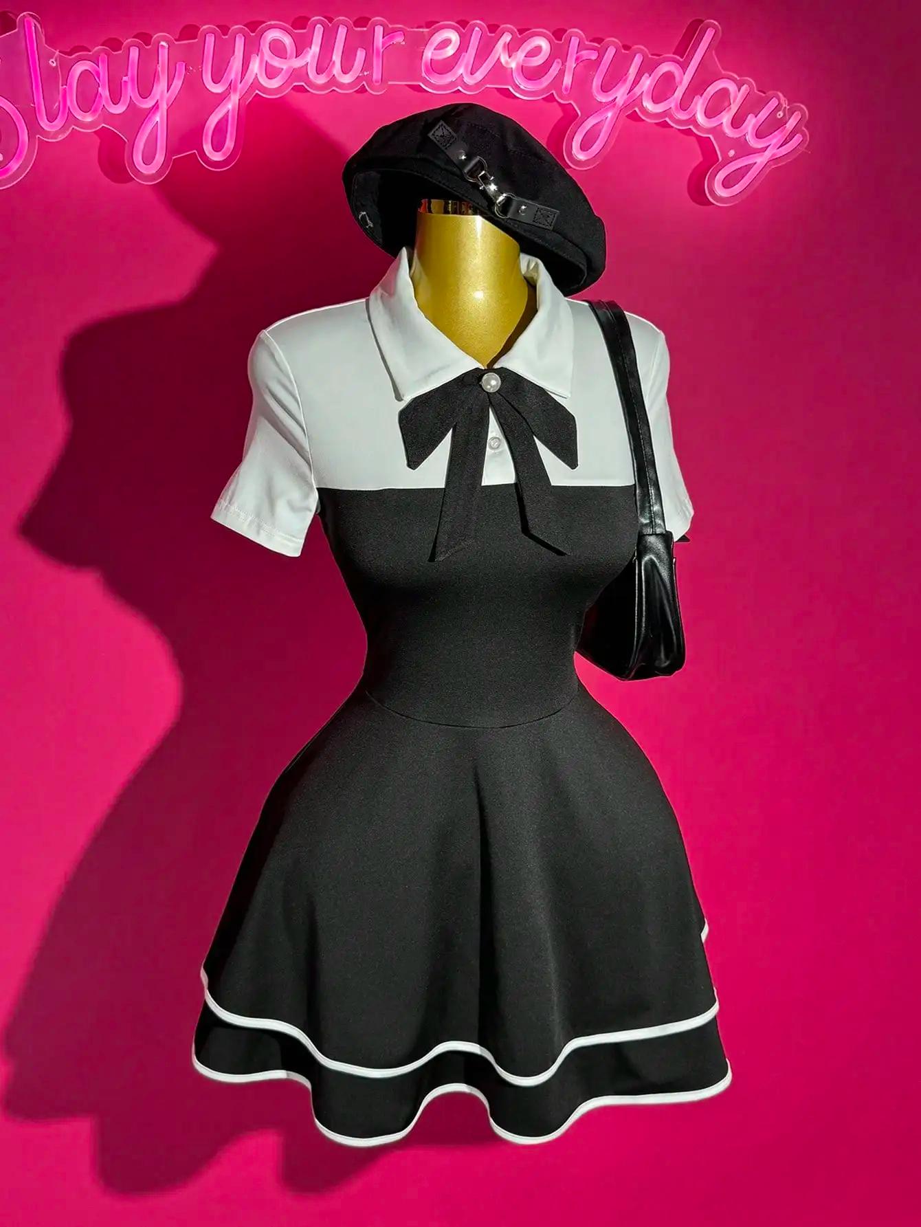 Mini robe bloc de couleur avec nœud papillon et col polo avec ourlet à volants, coupe trapèze pour u
