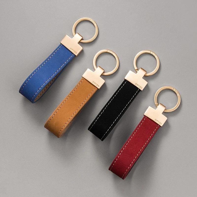 Corde de poignée exquise de haute qualité, pendentif de porte-clés Simple en peau de vache, anneau d