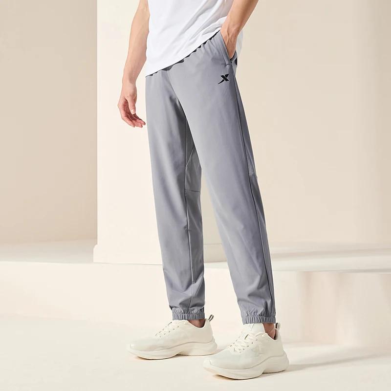 Pantalon de survêtement homme été respirant Xtep - Confort sportif quotidien pour activités plein air