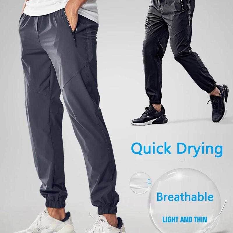 Pantalons de Sport à séchage rapide pour hommes, pantalons de course avec poches zippées, pantalons