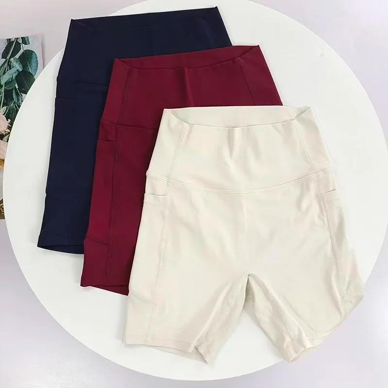 Short de Yoga taille haute pour femmes, avec poches latérales, longueur quater pour le cyclisme, le