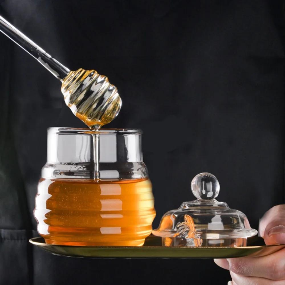 Pot de miel transparent avec louche et couvercle, accent d'abeille, précieux, cuisine, bouteille de