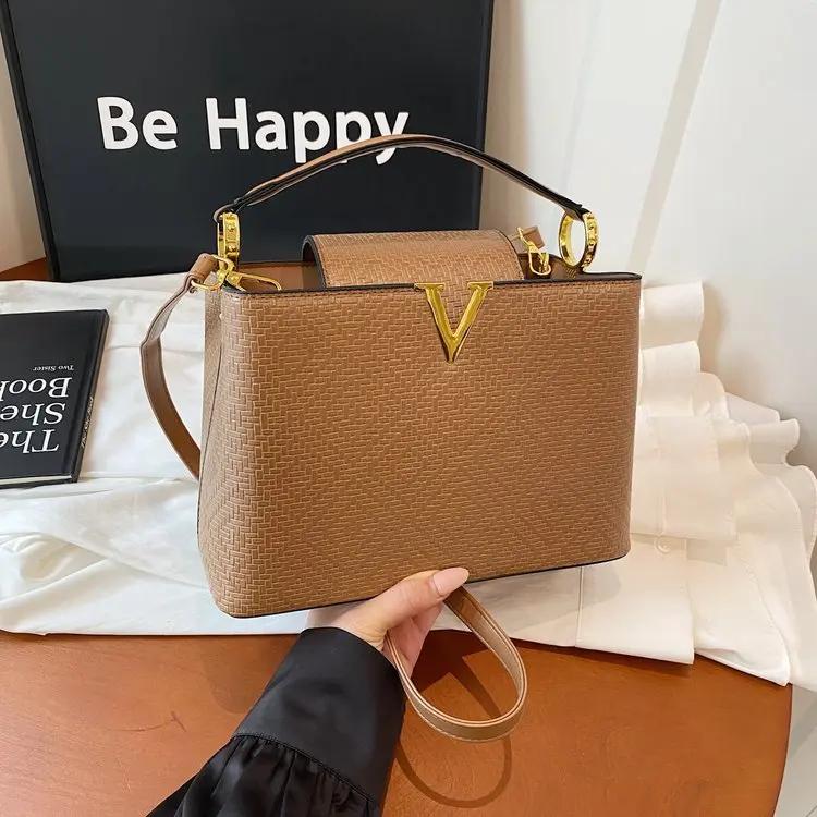 Sac à langer en cuir élégant et décontracté pour femme, grande capacité, texturé, inspiré des créate