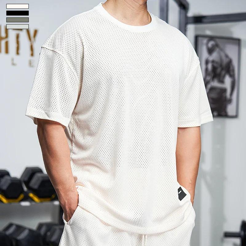 T-shirt musculaire homme gym - Chemise course tennis football entraînement ample séchage rapide