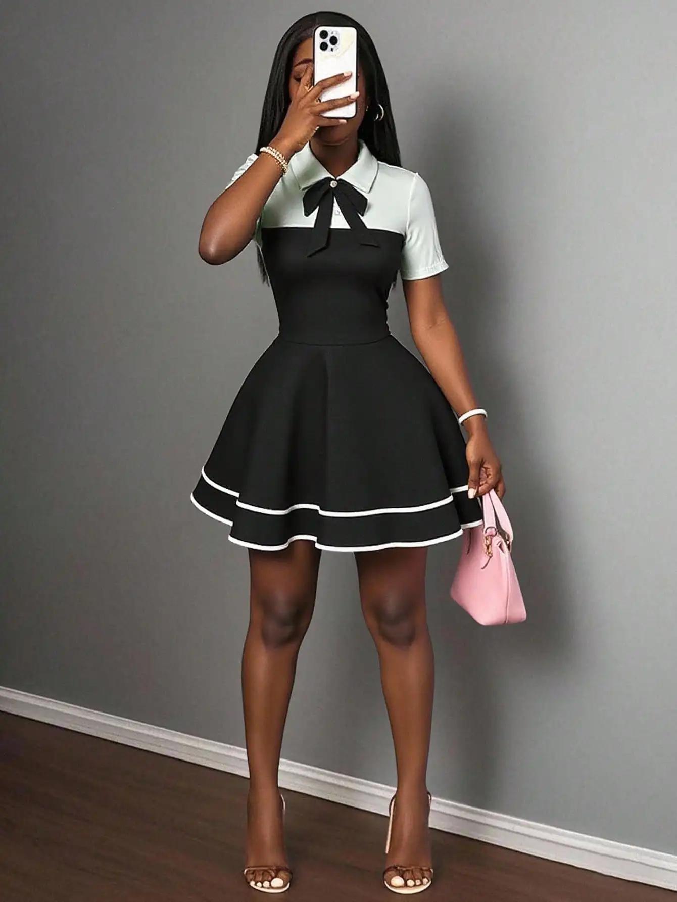 Mini robe bloc de couleur avec nœud papillon et col polo avec ourlet à volants, coupe trapèze pour u