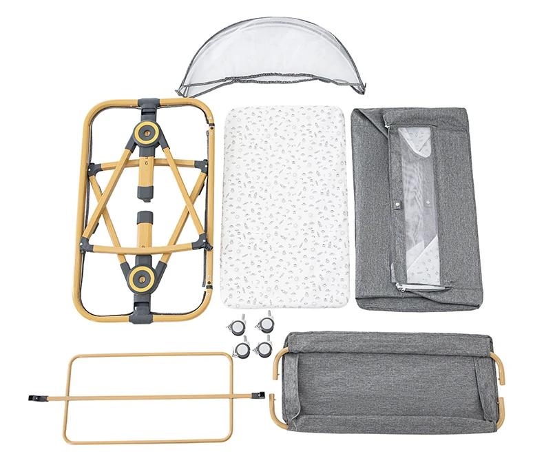 Lit bébé multifonctionnel avec réglage de hauteur pliable, berceau portable et mobile à accrocher au