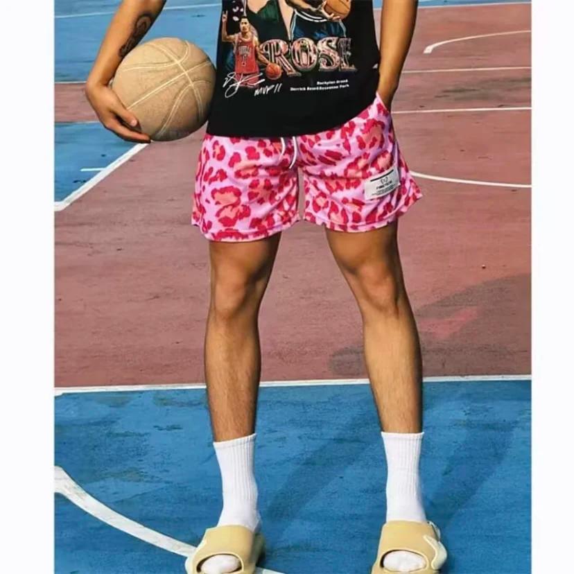 Nouveaux pantalons de survêtement de basket-ball en maille d'été Shorts de Fitness hommes séchage ra