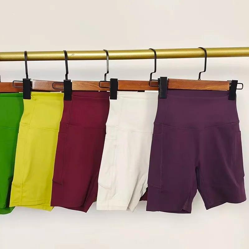 Short de Yoga taille haute pour femmes, avec poches latérales, longueur quater pour le cyclisme, le