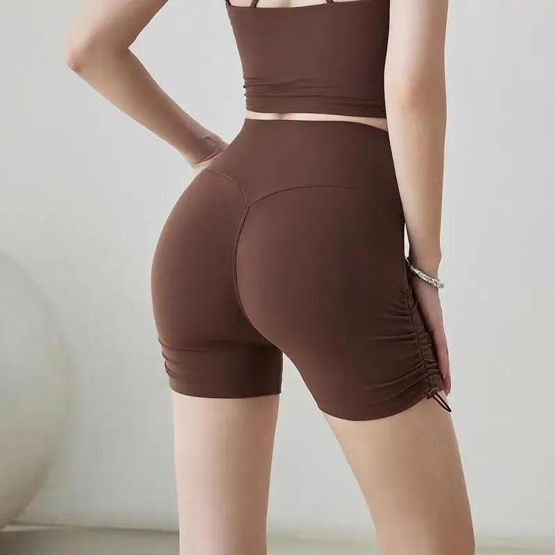 Shorts de yoga taille haute ajustables pour femmes avec cordon de serrage, effet push-up et contrôle