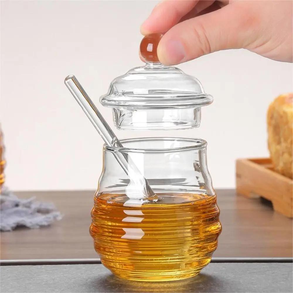 Pot de miel transparent avec louche et couvercle, accent d'abeille, précieux, cuisine, bouteille de