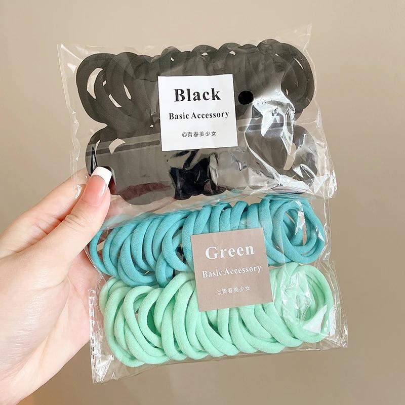 50 pièces coloré Ealstic cheveux corde queue de cheval tenir Scrunchie élastique pour les femmes de
