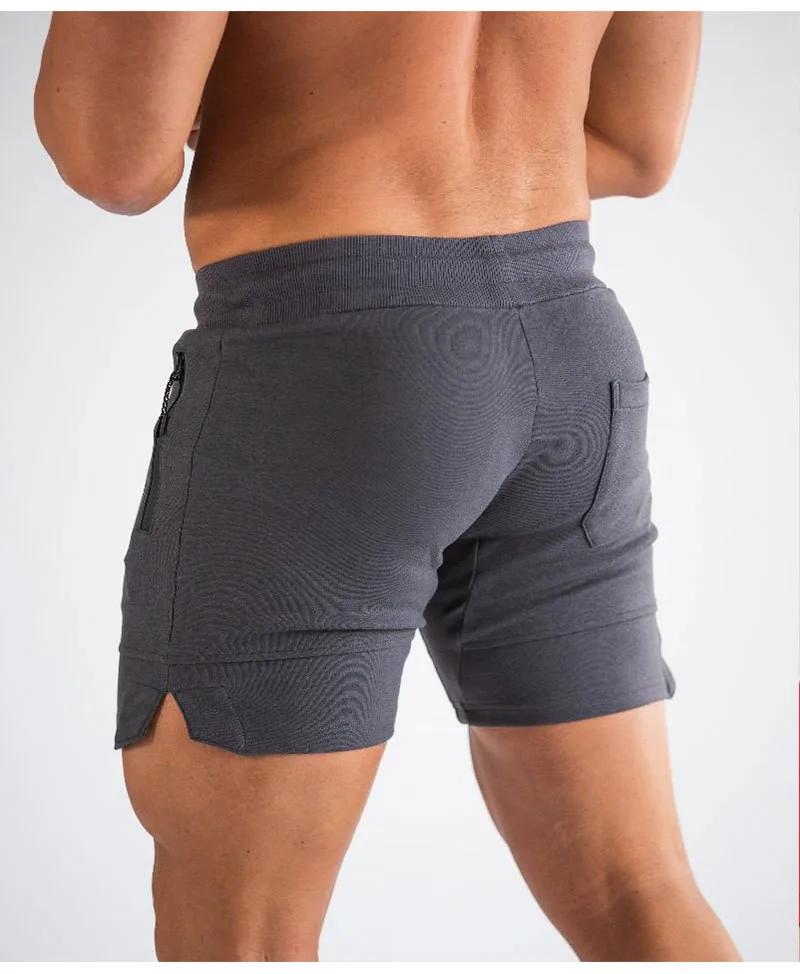 2024 nouveaux shorts de sport hommes shorts de plage pantalons de poche zippée pantalons de survêtem