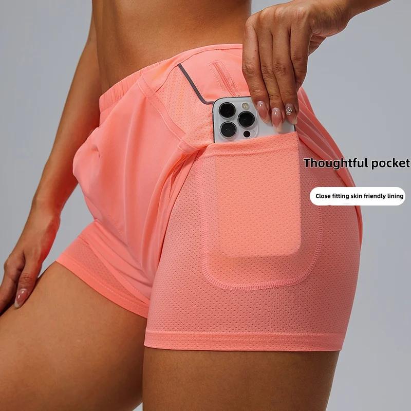 Short de sport à poches, pantalon trois quarts ample de course pour femmes, doublure à séchage rapid