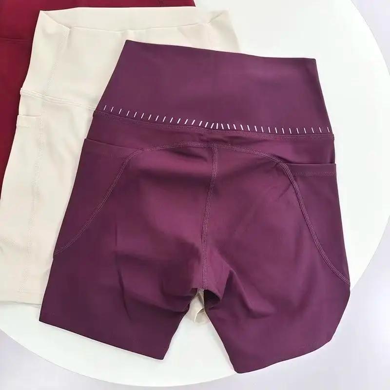 Short de Yoga taille haute pour femmes, avec poches latérales, longueur quater pour le cyclisme, le