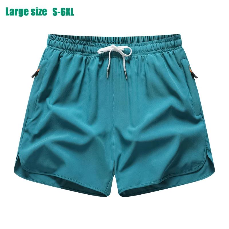 Shorts sport 3/4 pour hommes en soie glacée - Pantalons amples absorbants pour le running et le fitness