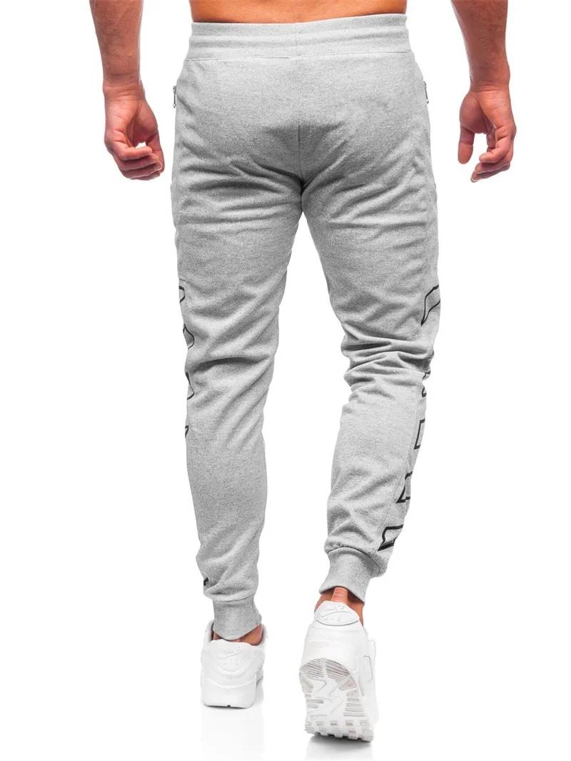 Printemps automne poche zippée hommes pantalons confortables pantalons de survêtement à séchage rapi