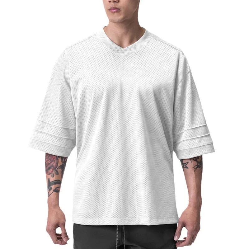 T-shirt de course oversize à épaules tombantes et col en V, manches courtes, en maille respirante po