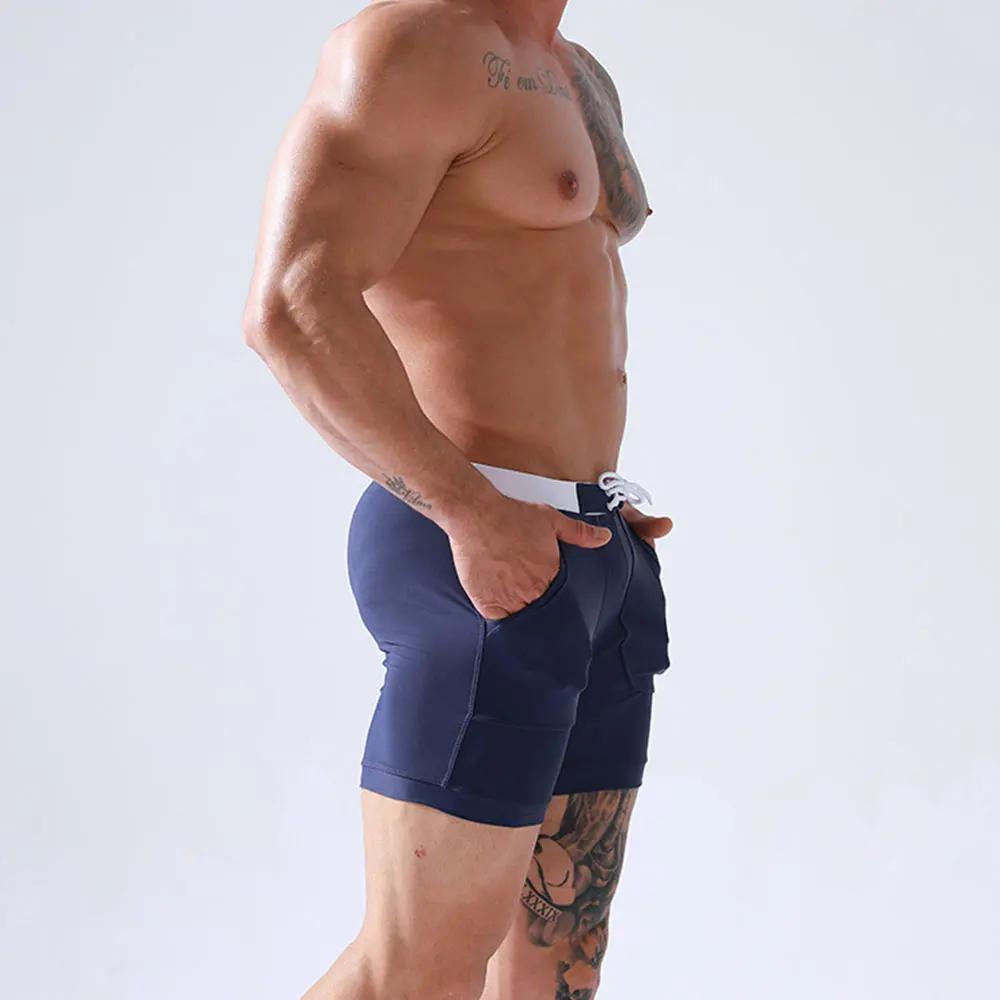 Maillot de bain extensible pour hommes, à séchage rapide, culotte de plage, avec poches, pour Sports