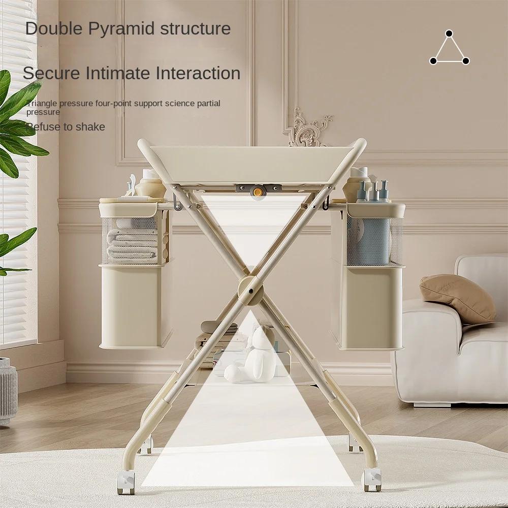 Table à langer pour bébé avec design multifonctionnel pliable, hauteur réglable, construction stable