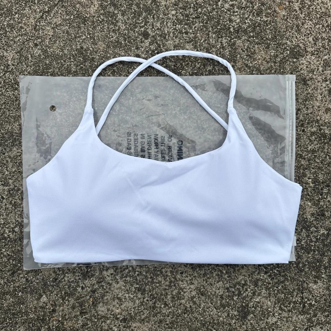 Soutien-gorge de fitness pour femmes couleur unie - Haut serré avec dos croisé et push-up pour l'entraînement complet